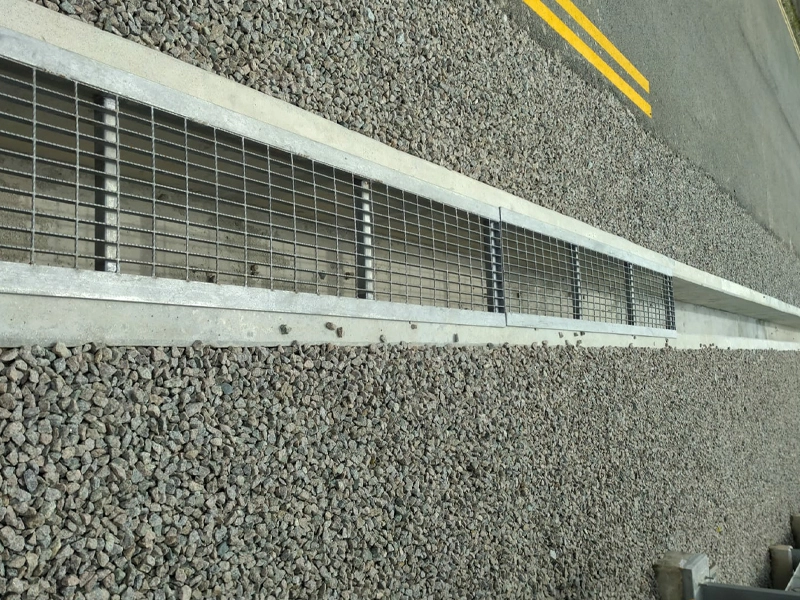 Application de la grille de couverture de tranchée en acier